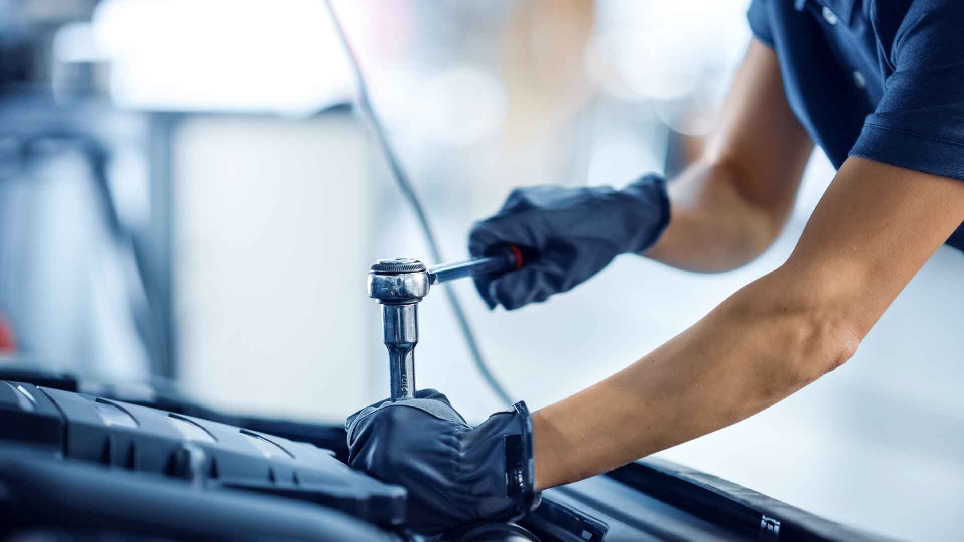 Mechanic repairing an engine